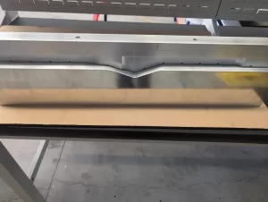 Aluminium CNC part with drilled holes on top surface