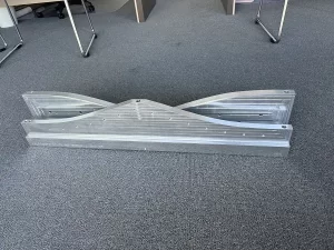 Assembled curved aluminium part