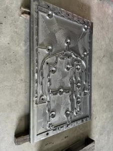 Close-up of detailed CNC machined mold with contour lines
