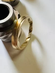 Close up of precision steel housing with bronze ring