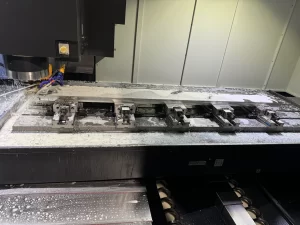Coolant-covered workpiece during CNC machining