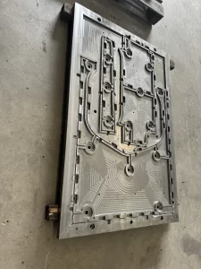 Milled metal mold showcasing symmetrical design features