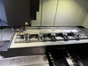 Milling operation on metal block using CNC machine
