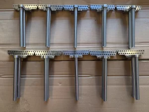 Rod mounts arranged at an angle across surface