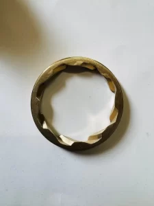 Spiral machined components stacked on display