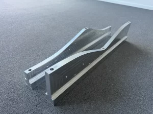 Two machined aluminium parts