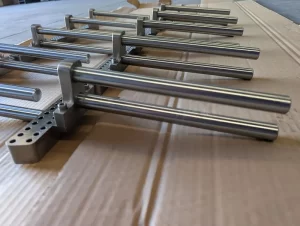 Upright rod brackets displayed in rows